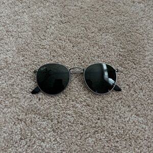 Ray-Ban sunglasses.